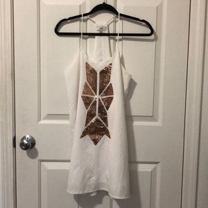 White sling dress with copper sequins
